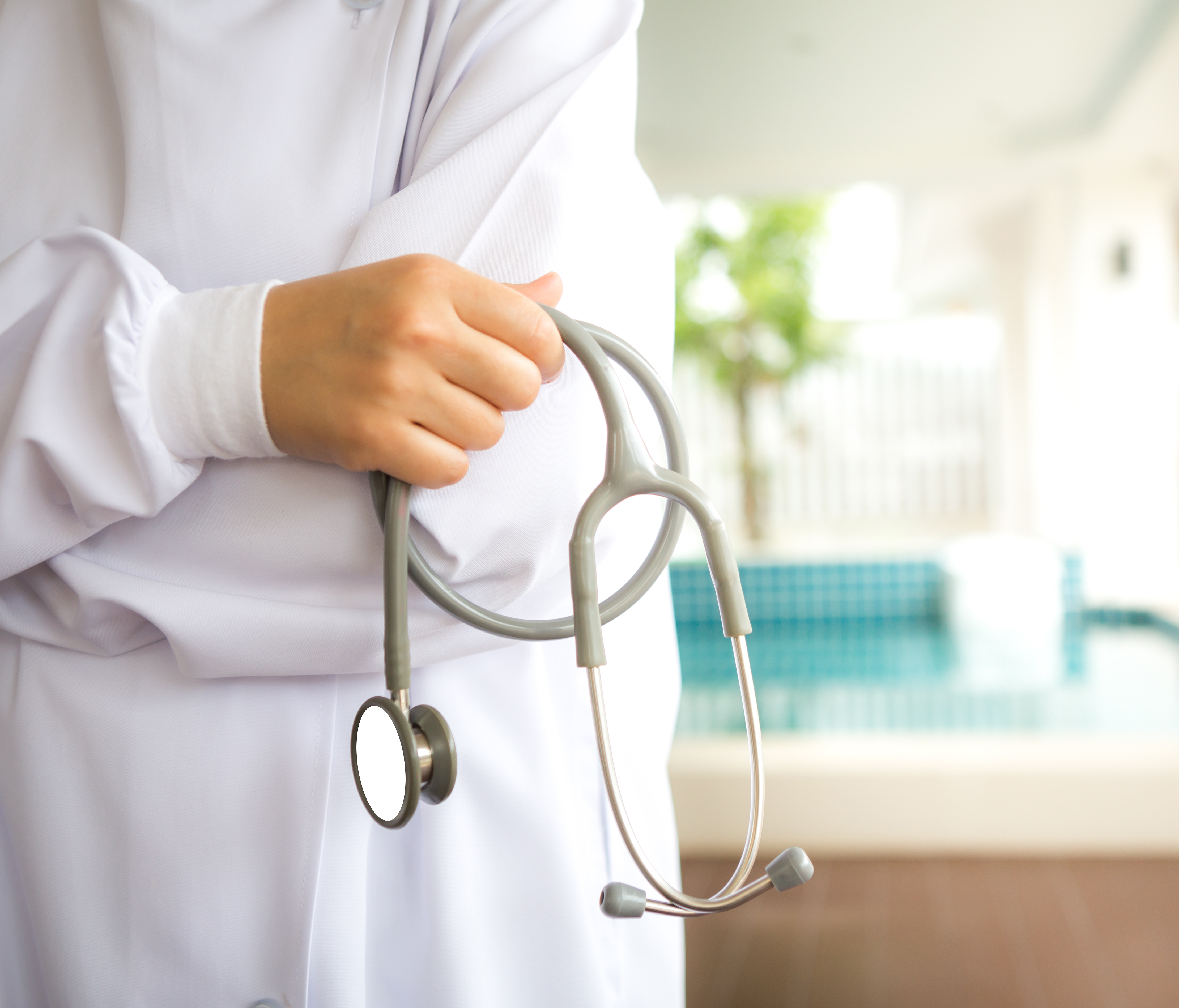 Doctor with stethoscope in the hands